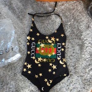 Black/Multicolor Gucci swimsuit. bag included…